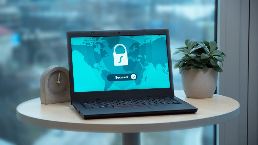 A laptop with a padlock, representing database access control in AI-built apps